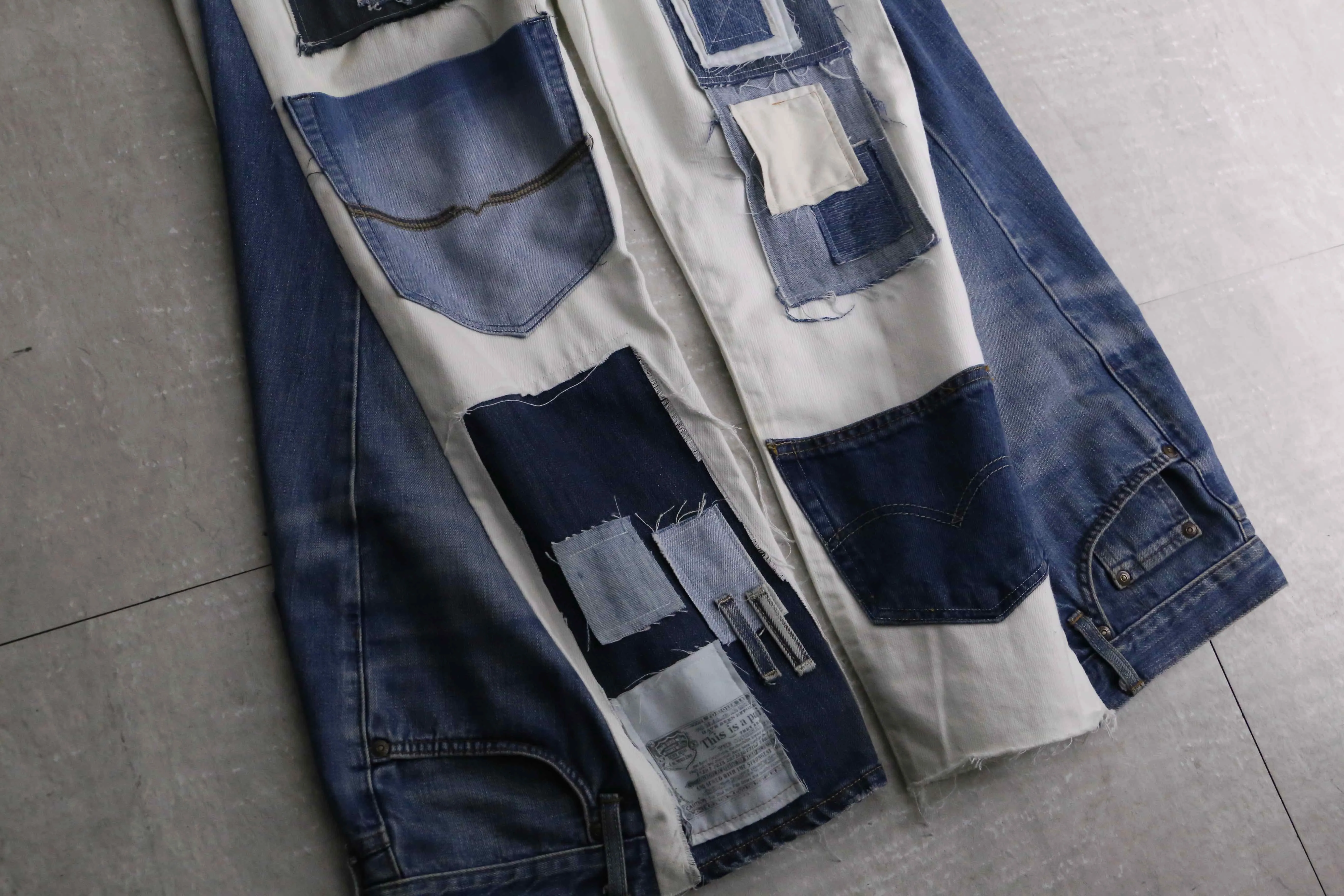 remake "再構築" denim design patch white flare denim pants